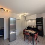 Cuisine avec acc&egrave;s direct chambre